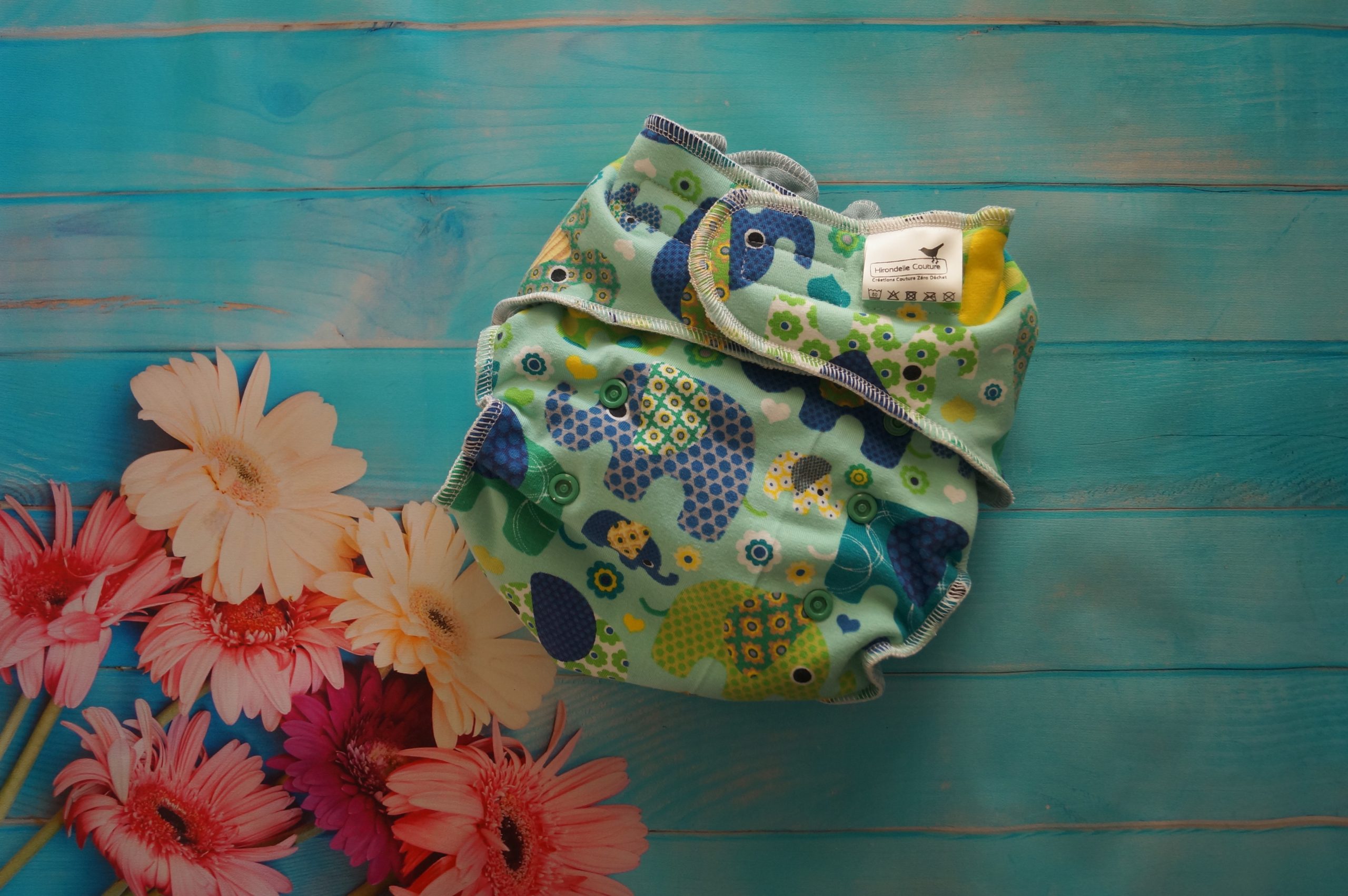 Couche classique + Booster Eléphants verts